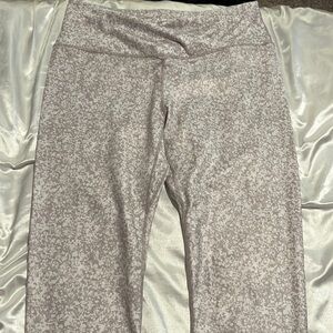 Patterned grey and white leggings.